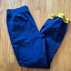 Cotopaxi Ara Jogger men's sz S blue with yellow cuffs, good pre owned condition